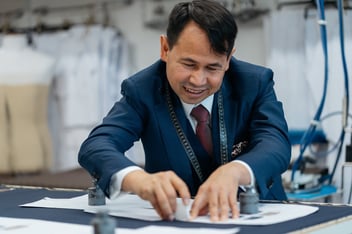 Lawrence-Fashion-08-tailor-cutting-suit